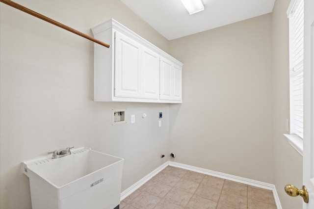 laundry area featuring sink, cabinets, washer hookup, hookup for an electric dryer, and hookup for a gas dryer