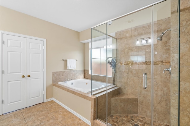 bathroom featuring separate shower and tub and tile patterned flooring