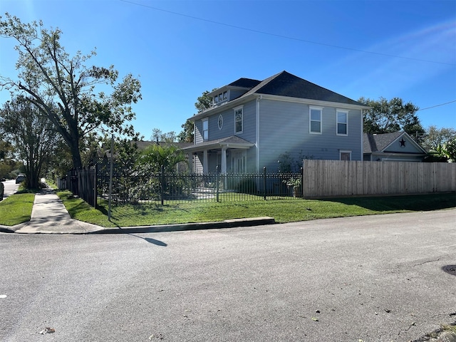 1201 Walton St, Houston, TX 77009 - view of home's exterior with a fenced front yard