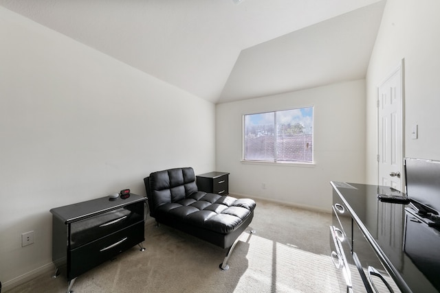 living area with light carpet and vaulted ceiling