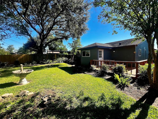 view of yard featuring a deck