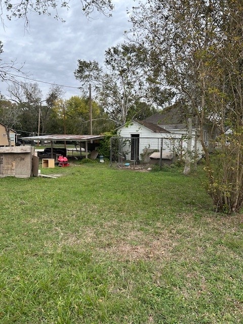 view of yard with a carport