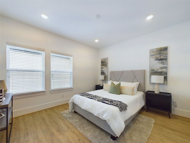 bedroom featuring light wood-type flooring