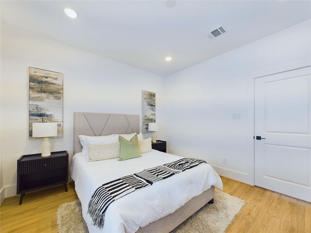 bedroom featuring light wood-type flooring