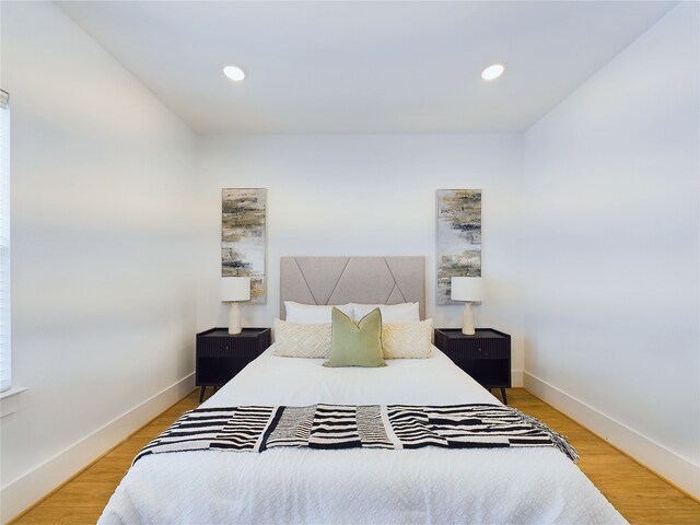 bedroom featuring hardwood / wood-style floors