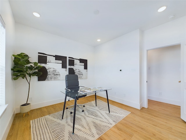 office space featuring light hardwood / wood-style floors