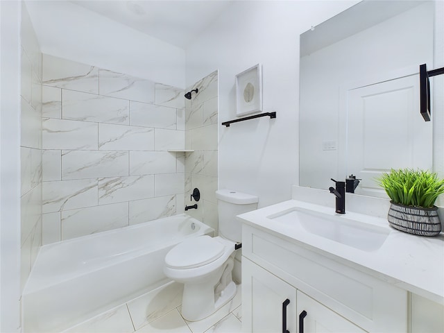 full bathroom featuring vanity, toilet, and tiled shower / bath