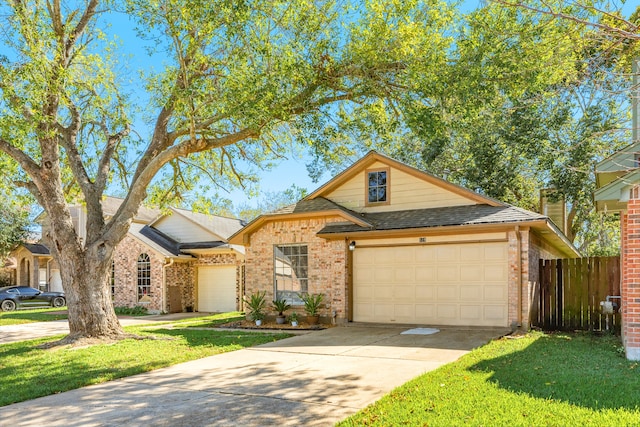 view of front facade with a front lawn and a garage