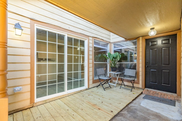 entrance to property featuring a deck