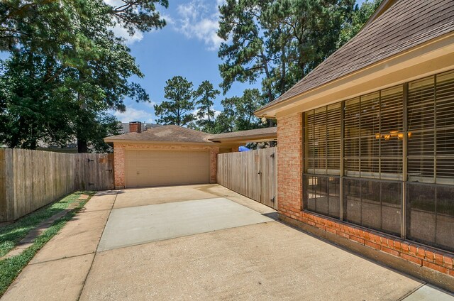 view of patio featuring a garage