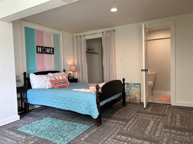 bedroom featuring dark colored carpet