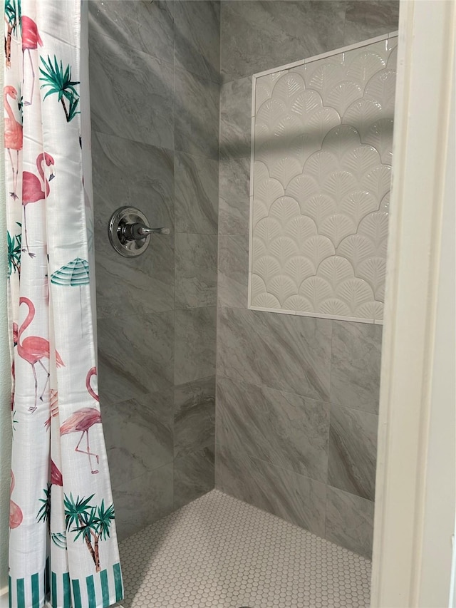 bathroom featuring walk in shower