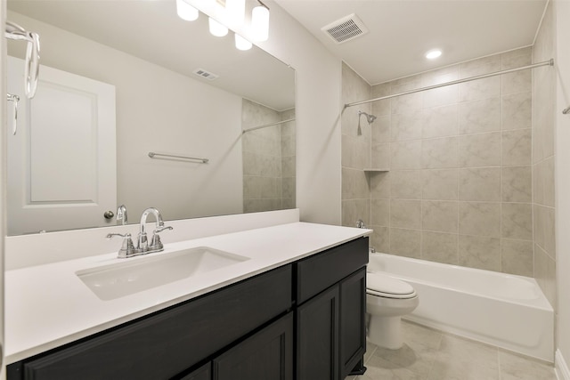 bathroom with visible vents, toilet, vanity, and  shower combination
