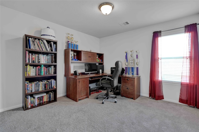 view of carpeted office space