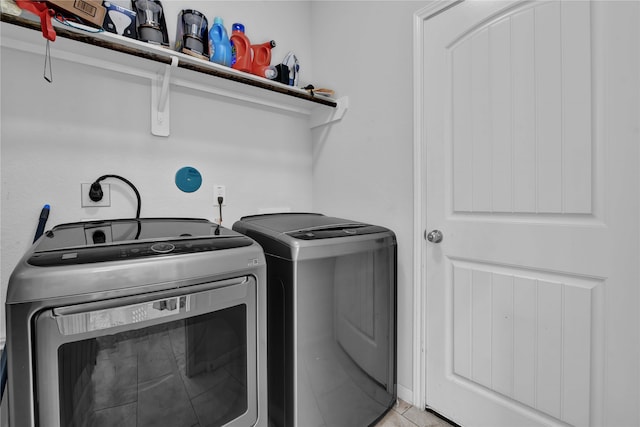 laundry room featuring washing machine and dryer