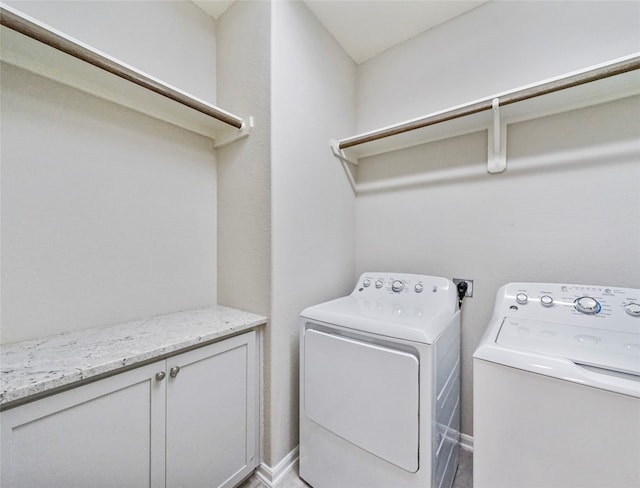 washroom featuring independent washer and dryer