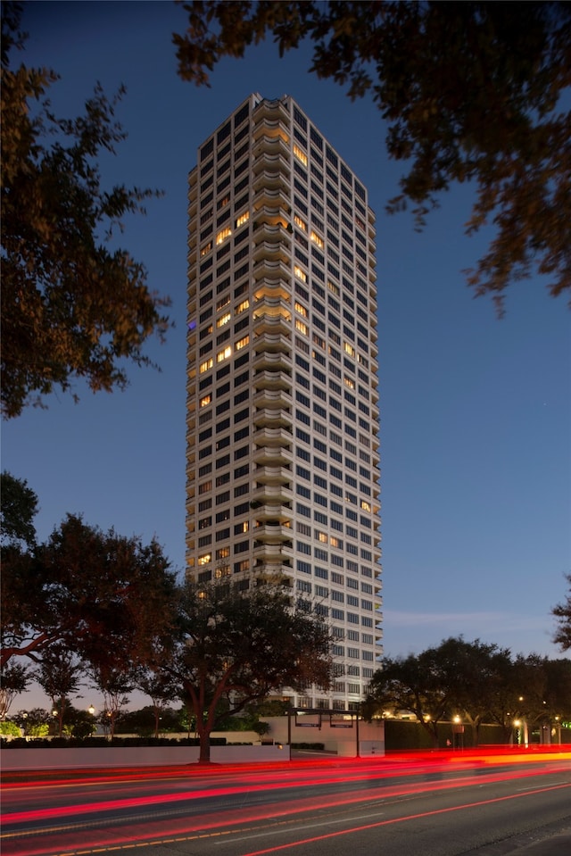 view of outdoor building at dusk