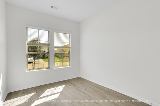 empty room featuring light hardwood / wood-style floors