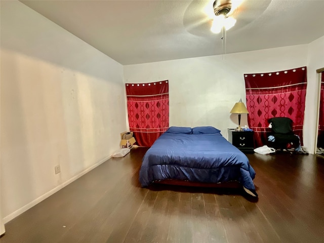 bedroom featuring hardwood / wood-style floors and ceiling fan