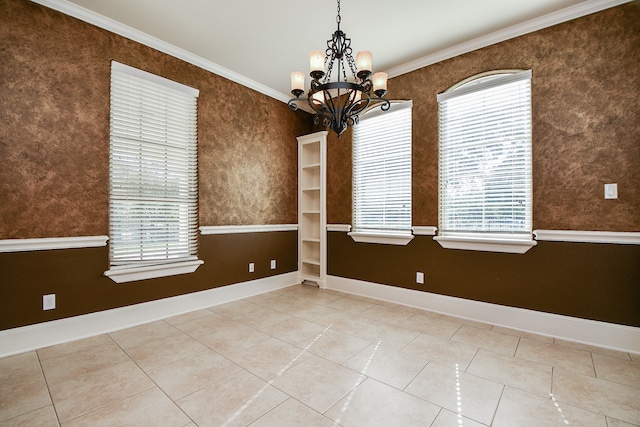 spare room featuring crown molding, a notable chandelier, and light tile patterned flooring