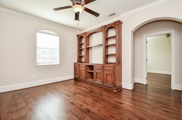 unfurnished living room with dark hardwood / wood-style flooring, ceiling fan, and ornamental molding