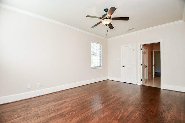 unfurnished room featuring ceiling fan, dark hardwood / wood-style flooring, and ornamental molding