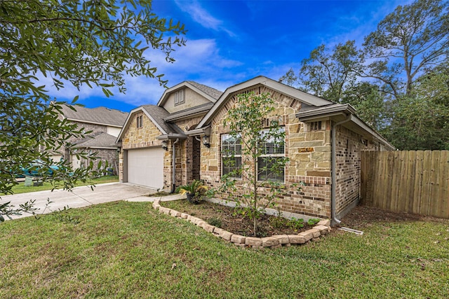 view of front of home featuring a front lawn and a garage