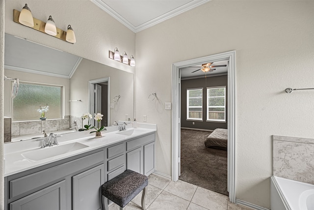 bathroom with tile patterned floors, ornamental molding, vanity, ceiling fan, and a bath