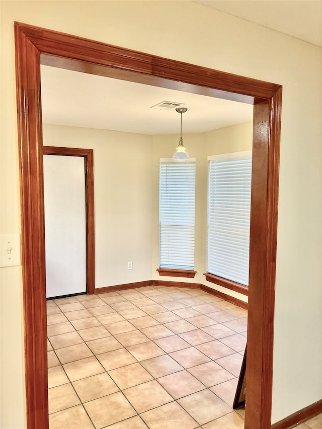 view of tiled spare room