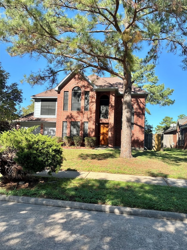 view of front facade with a front lawn