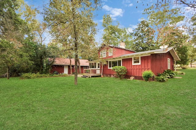 view of yard featuring a wooden deck