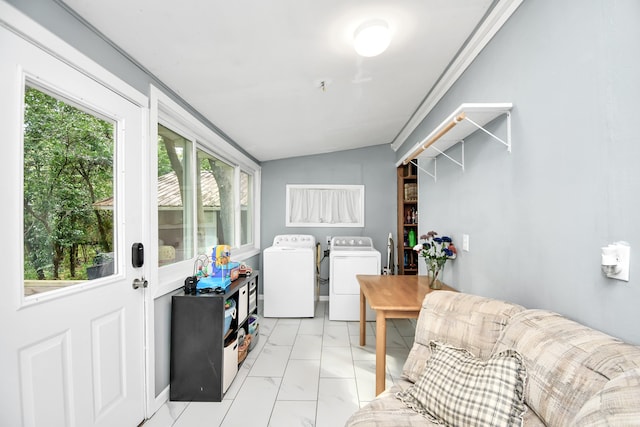 clothes washing area with washer and dryer