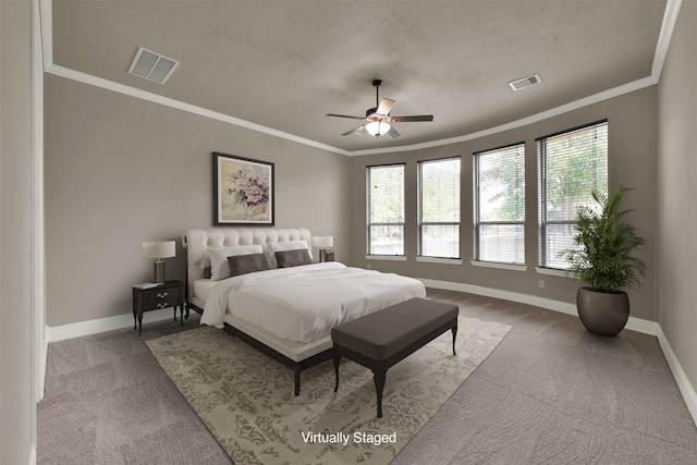 bedroom featuring ceiling fan, light colored carpet, crown molding, and multiple windows