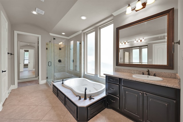 bathroom featuring tile patterned flooring, ornamental molding, separate shower and tub, and vanity