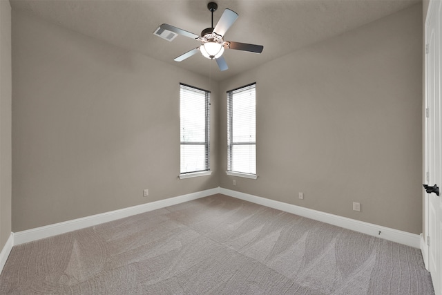 empty room with light carpet and ceiling fan