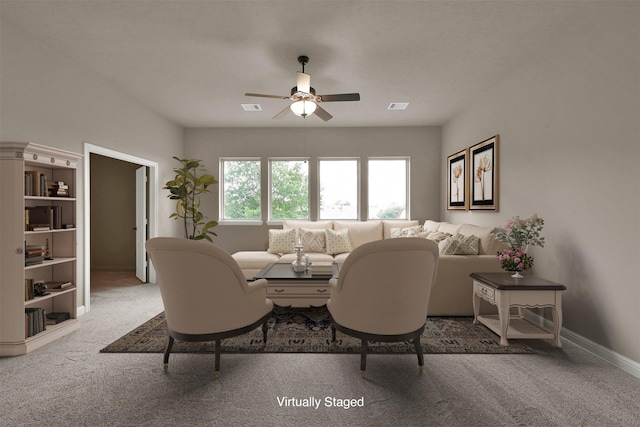 living room with ceiling fan and carpet floors