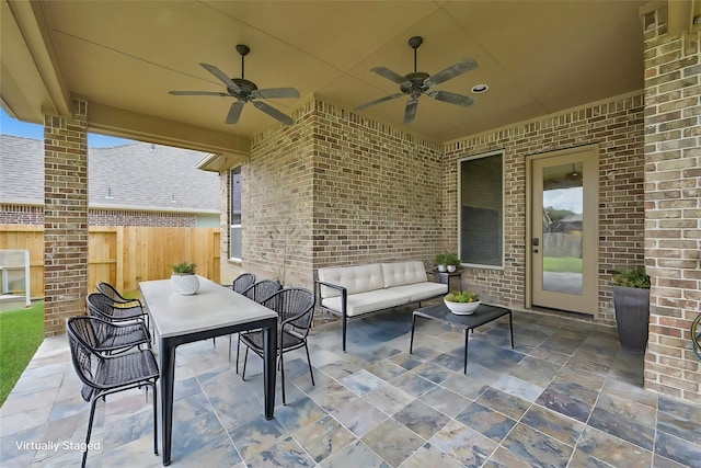 view of patio / terrace with ceiling fan and an outdoor hangout area