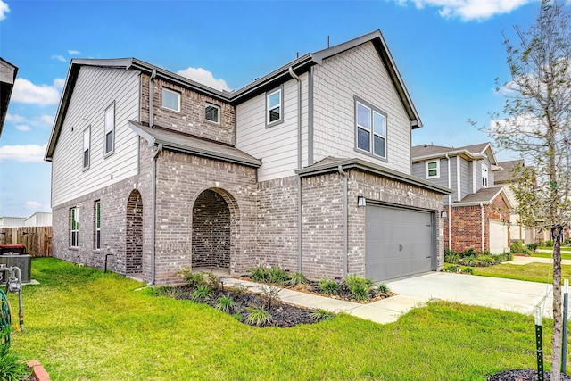 25342 Trinity Oakley Ct, Katy, TX 77493 - view of front of house with a garage, brick siding, driveway, and central AC