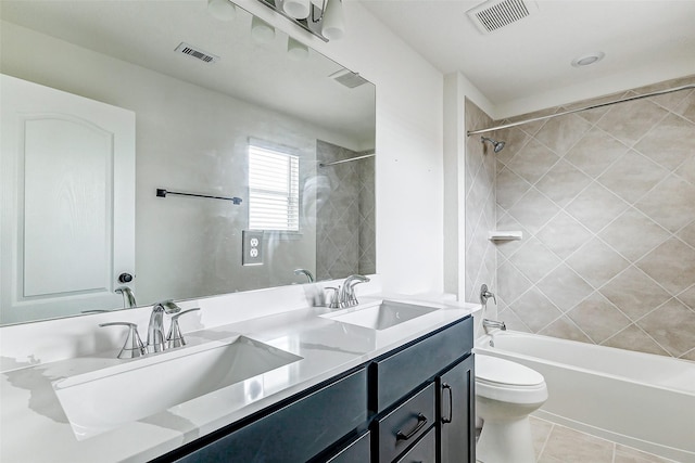 25342 Trinity Oakley Ct, Katy, TX 77493 - full bathroom with toilet, double vanity,  shower combination, and tile patterned flooring