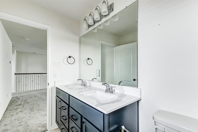 25342 Trinity Oakley Ct, Katy, TX 77493 - bathroom with double vanity and toilet