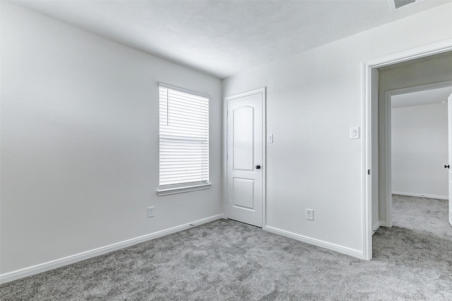 25342 Trinity Oakley Ct, Katy, TX 77493 - unfurnished room featuring carpet floors and baseboards