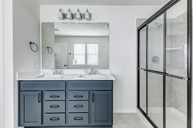 25342 Trinity Oakley Ct, Katy, TX 77493 - full bath with a stall shower, double vanity, and tile patterned floors
