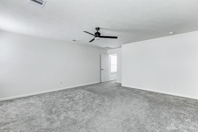 25342 Trinity Oakley Ct, Katy, TX 77493 - carpeted spare room with ceiling fan, baseboards, and a textured ceiling