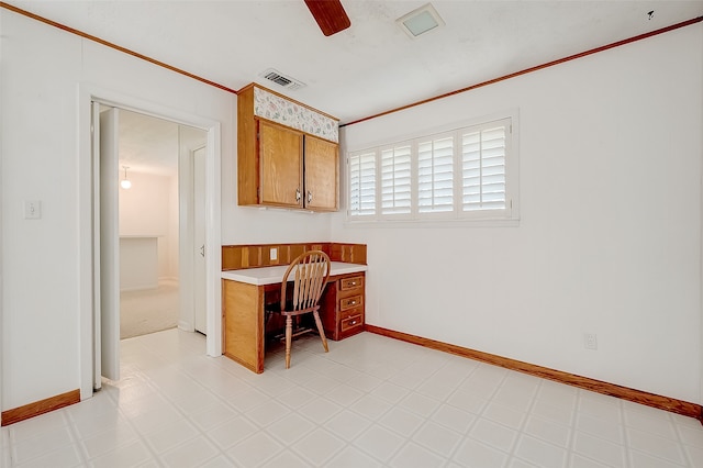 office area featuring built in desk and ceiling fan