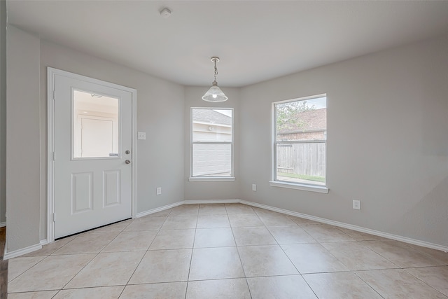 interior space featuring light tile patterned floors