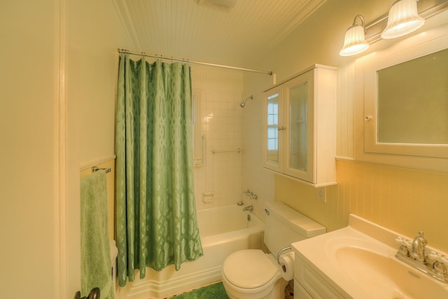 full bathroom featuring shower / bath combo, vanity, toilet, and crown molding