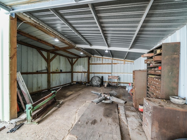 miscellaneous room featuring a garage and metal wall