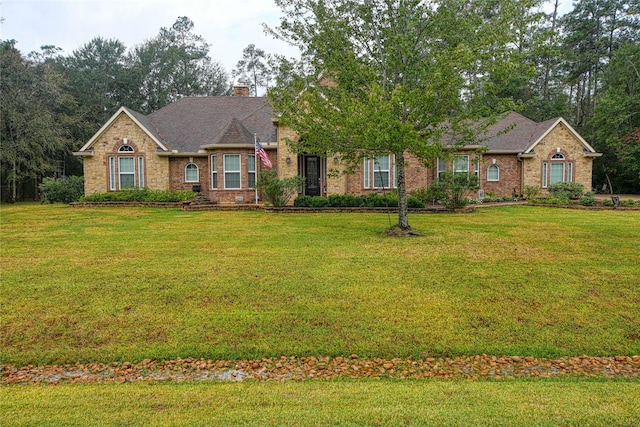 view of front of home with a front yard