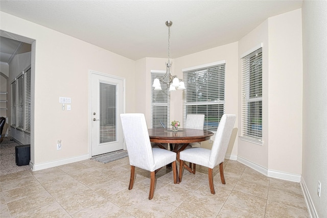 dining room featuring an inviting chandelier