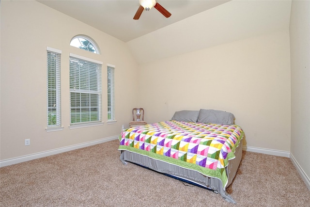 carpeted bedroom featuring ceiling fan and lofted ceiling